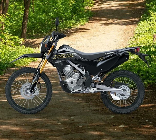 Image of 2026 KLX150 SE+ in action